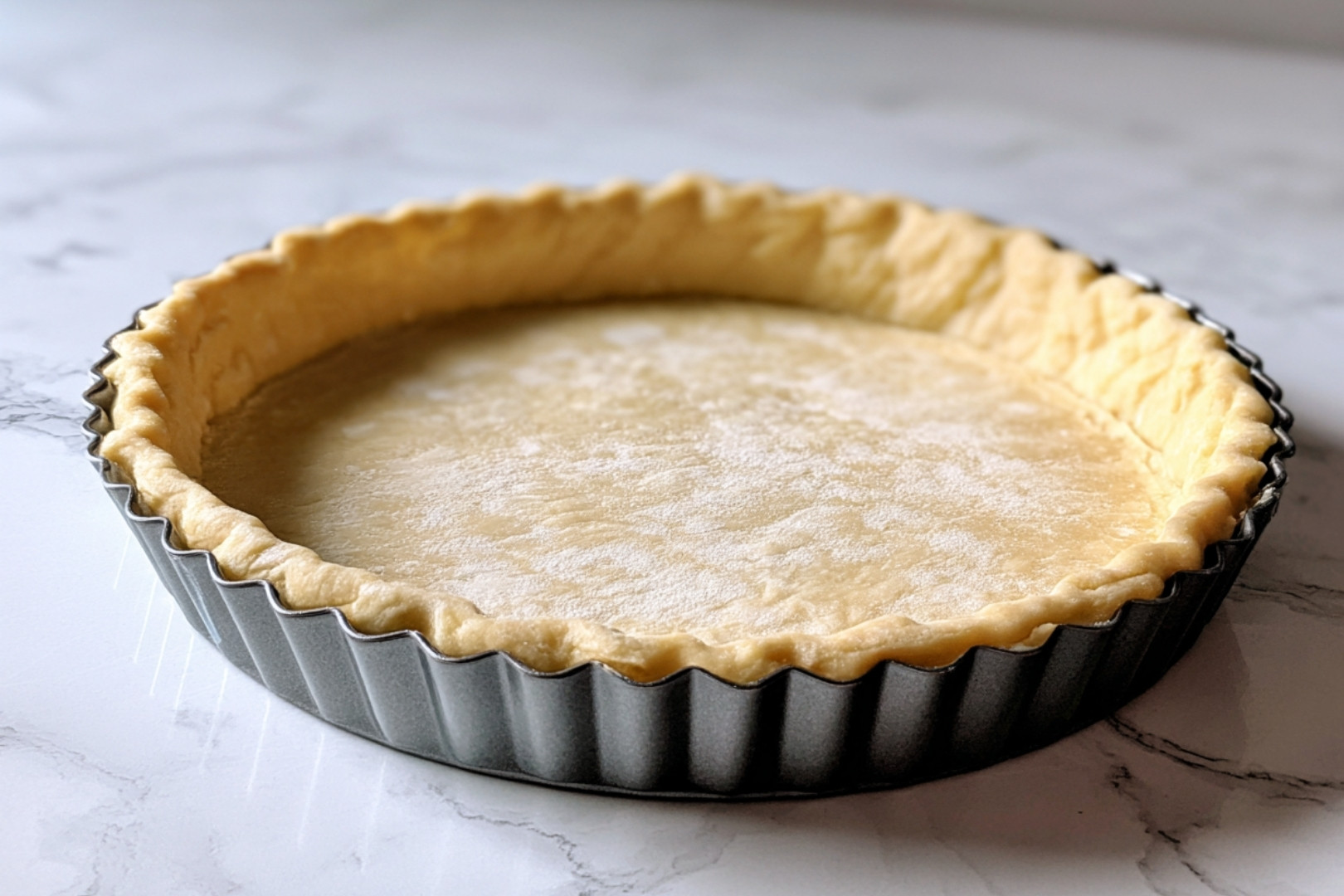 Fond de tarte brisée prêt pour la crème d'amandes